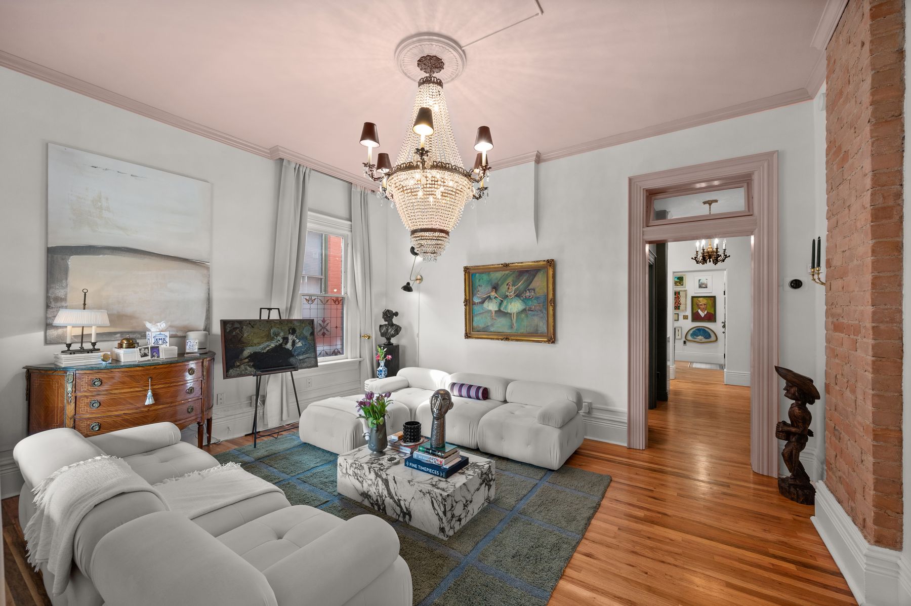 Parlor with blush pink ceiling, crystal chandelier and Degas in a gilt frame